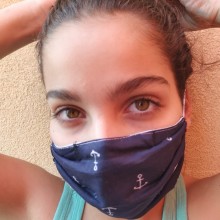 סרטון הסבר על אופן לבישת מסכת בד רב פעמית מבד